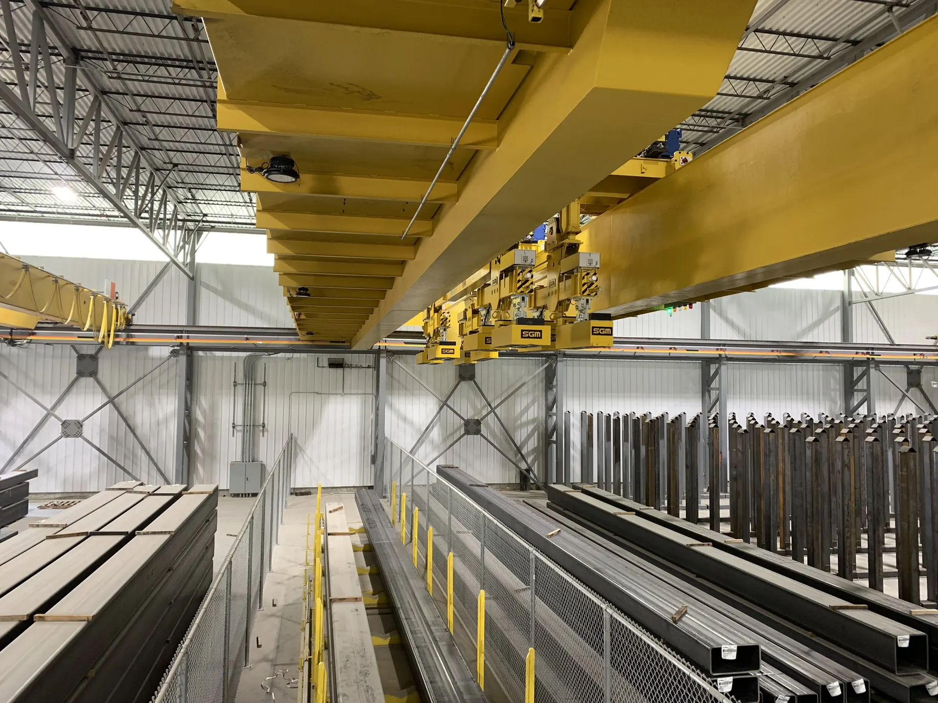 Overhead crane above tube and pipe storage racks