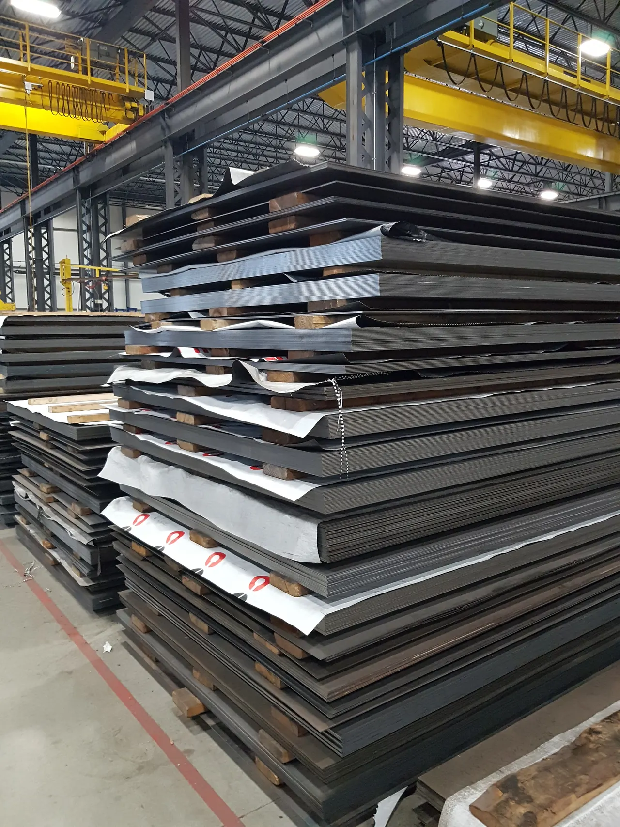Stacked steel sheet and plate