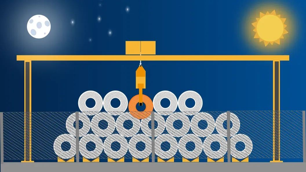 Overhead crane working over stacked coils through day and night