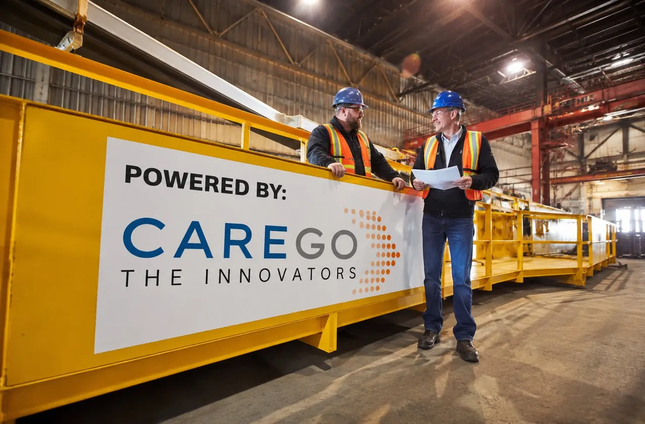Rows of steel coils inside a mill with an overhead crane