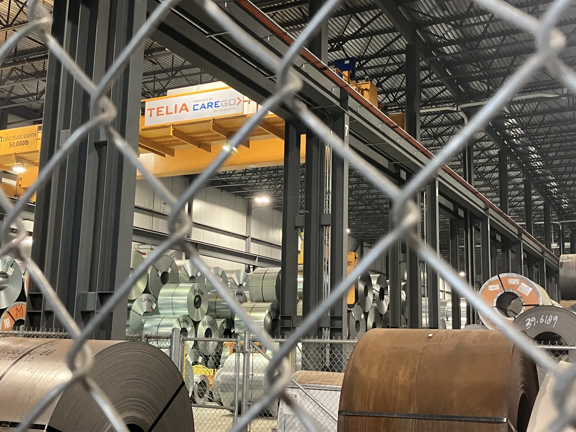 Zoned facility floor with protected crane operating areas